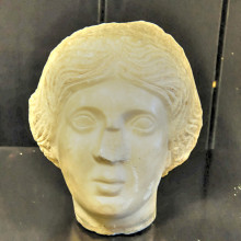 Head of a woman, part of a statue from the Roman period (from the 1st to the 3rd century)